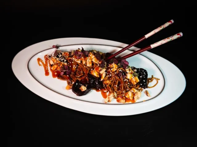 Soba with eel, tsao gu mushrooms and unagi sauce
