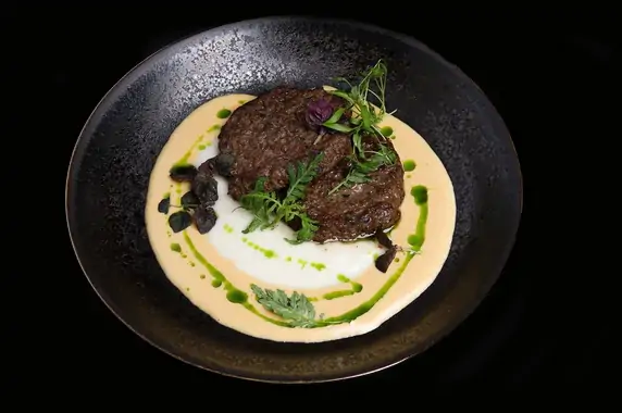 Marbled beef cutlets with pepper sauce and cauliflower puree