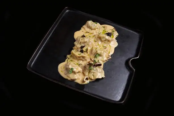 Dumplings with marbled beef in porcini mushroom sauce