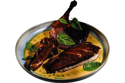 1/2 crispy duck in spicy sauce with Thai basil